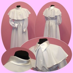 Alba komunijna dla dziewczynki z białym, atłasowy konierzykiem.